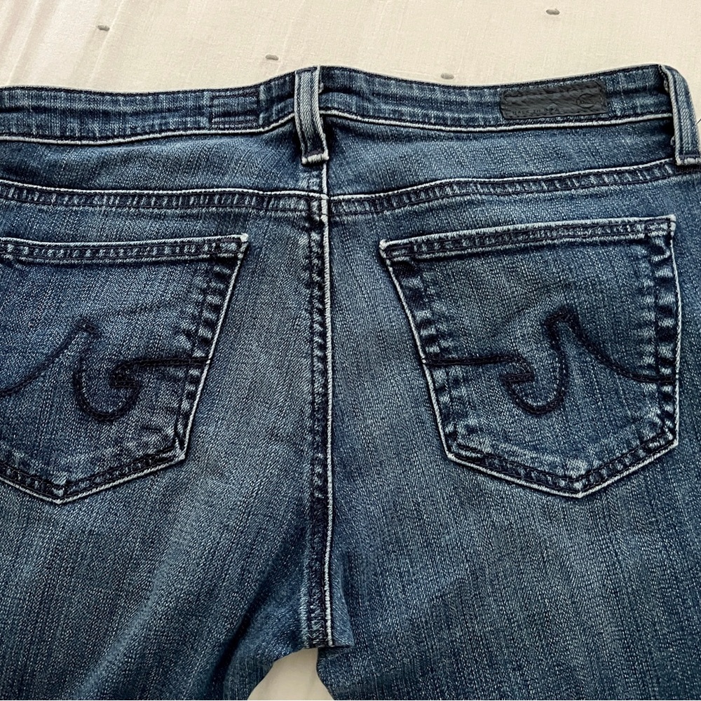 AG/Adriano Goldschmied blue denim low rise cropped jean.